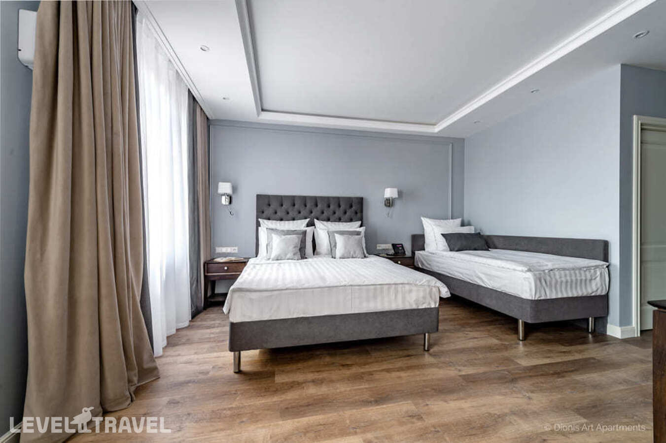 фотографии номера Трехместный делюкс отеля Dionis Art Apartments в Россия(Центральный район) - фото №1