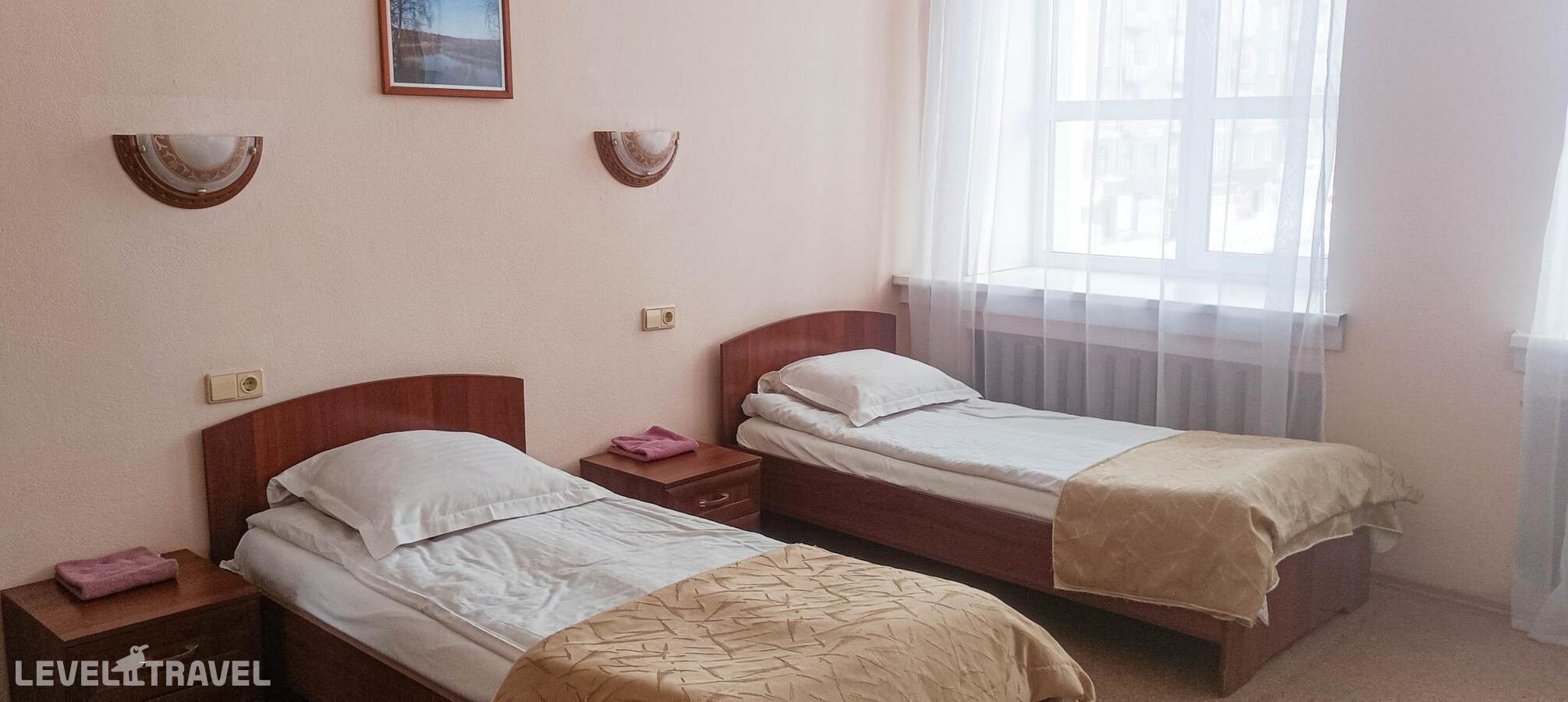 фотографии номера Экономичный (две односпальные кровати) отеля Smart Hotel KDO Новосибирск (Смарт отель КДО) в Россия(Новосибирск) - фото №1