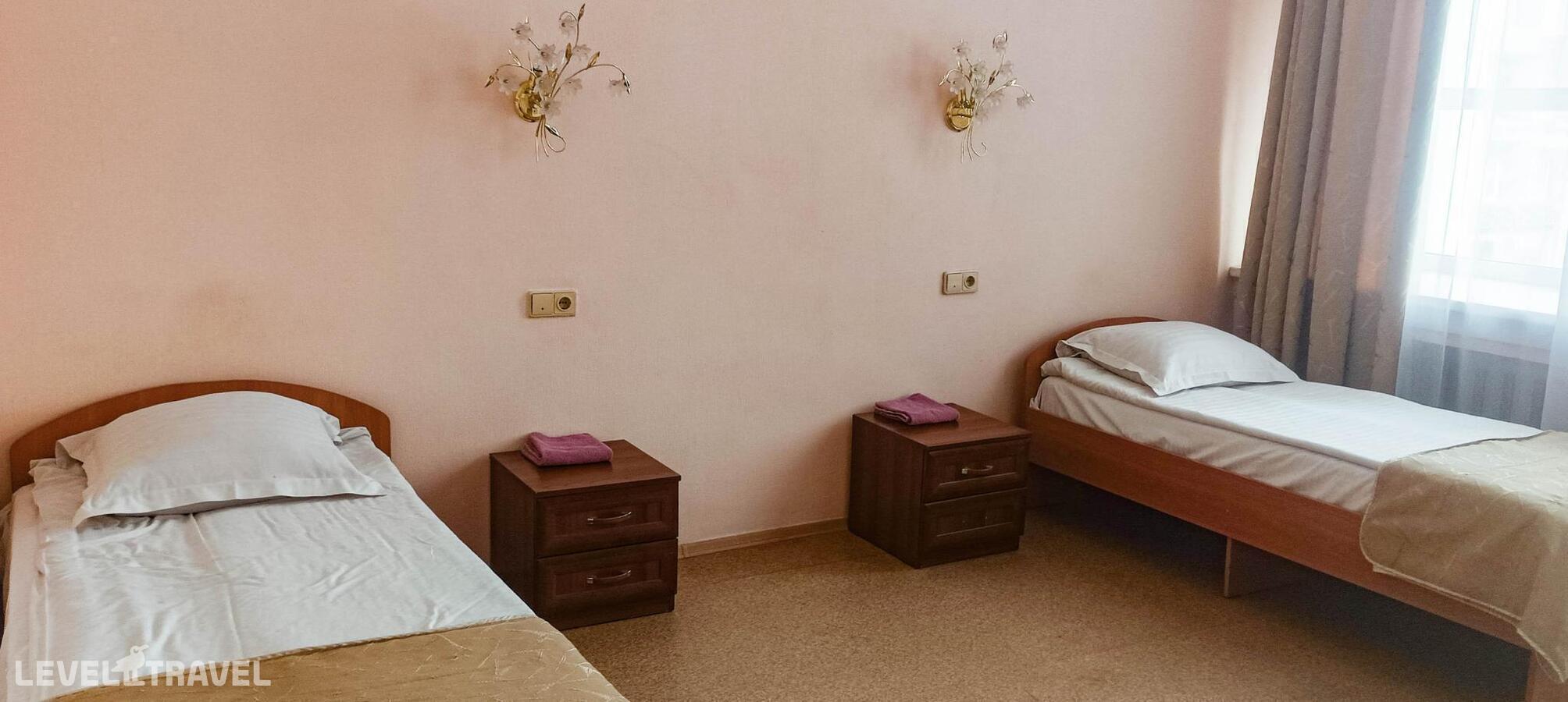 фотографии номера Экономичный (две односпальные кровати) отеля Smart Hotel KDO Новосибирск (Смарт отель КДО) в Россия(Новосибирск) - фото №2