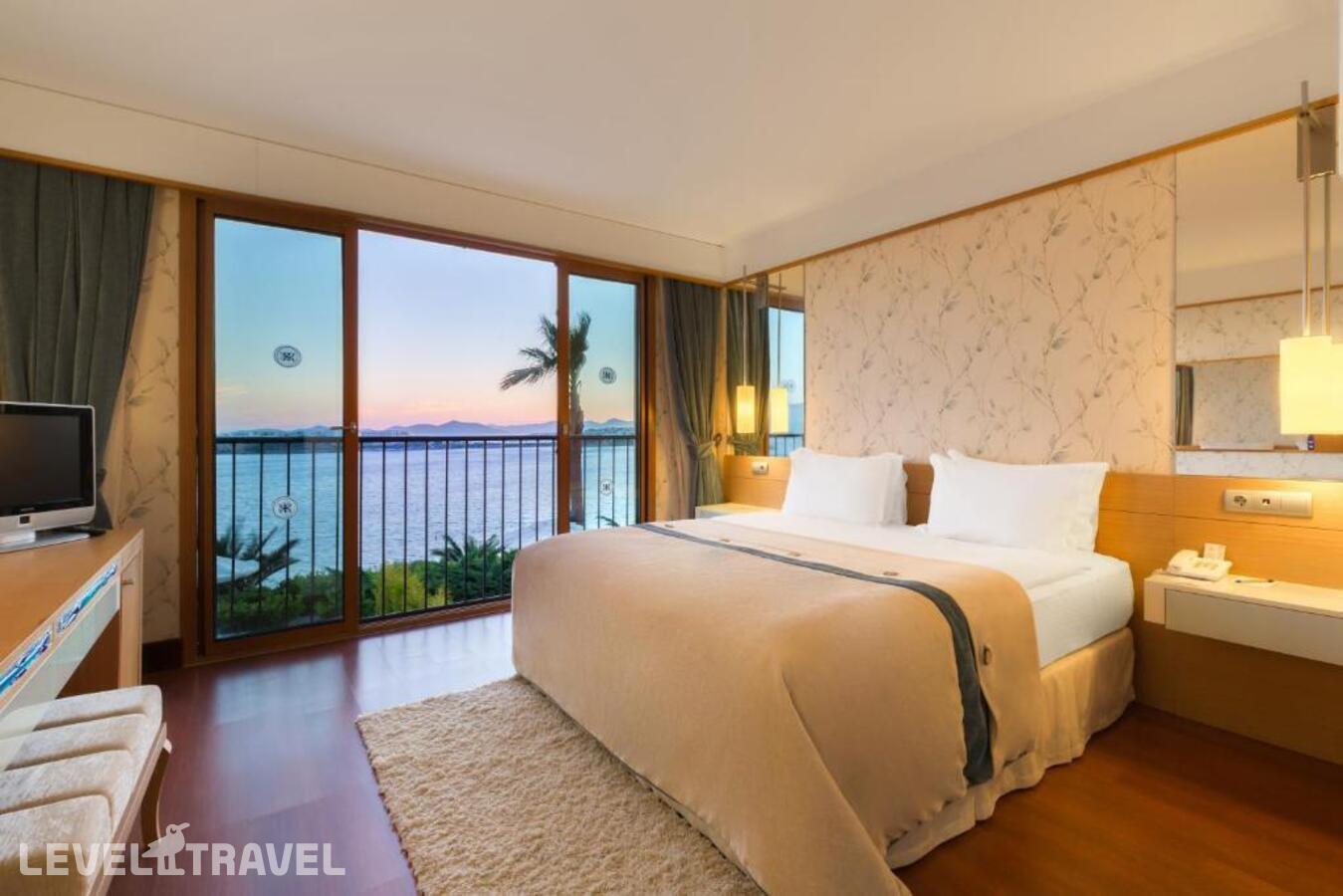 фотографии номера Улучшенный люкс отеля Kefaluka Resort в Турция(Акьярлар) - фото №39