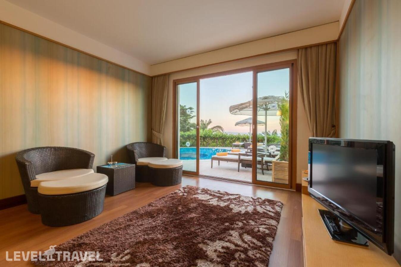 фотографии номера Улучшенный люкс отеля Kefaluka Resort в Турция(Акьярлар) - фото №36