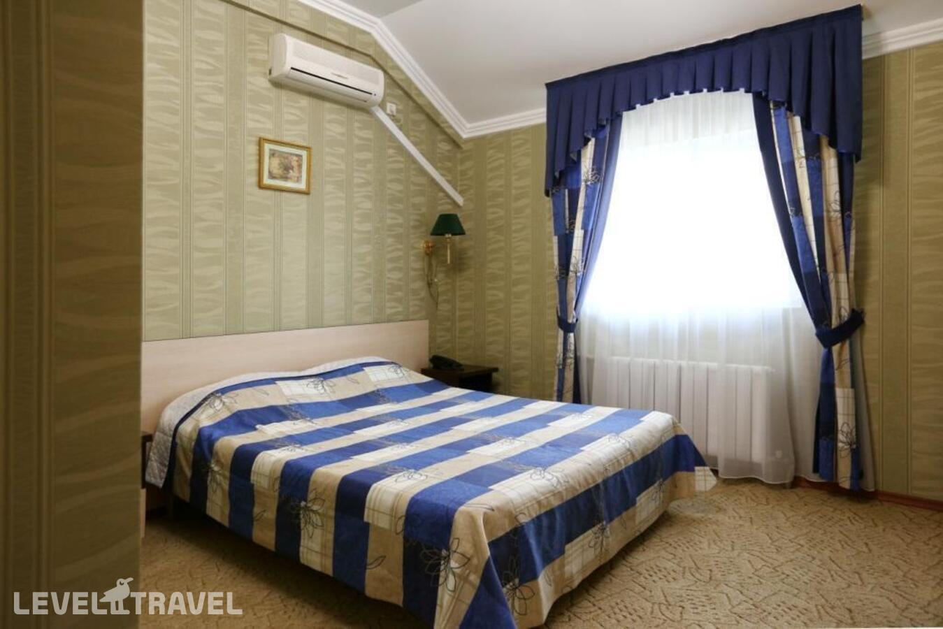 фотографии номера Стандартный номер отеля Отель Гранд Каньон в Россия(Мамайский Перевал) - фото №4