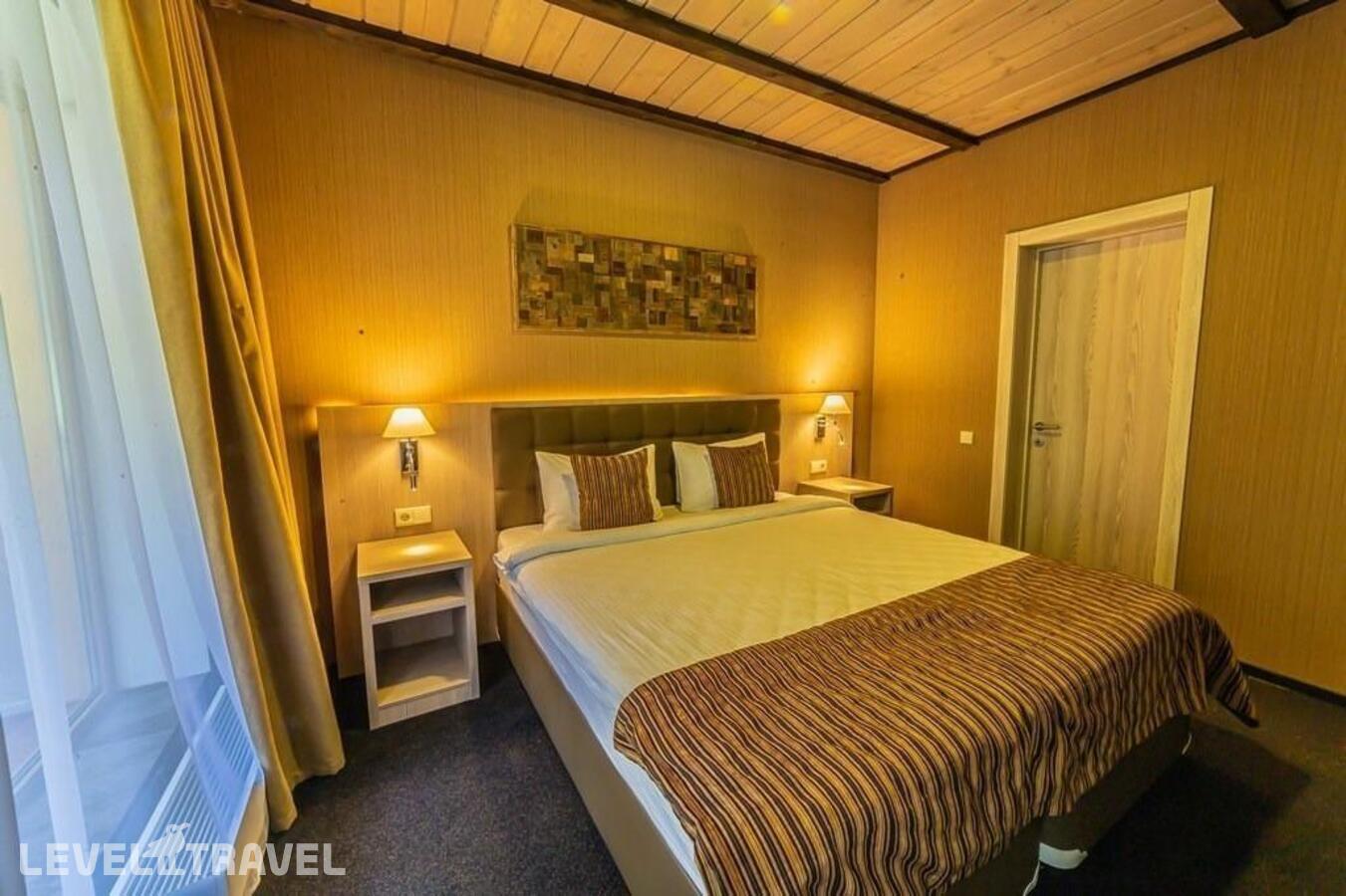 фотографии номера Апартаменты отеля Arkhyz Royal Resort & Spa в Россия(Архыз) - фото №2
