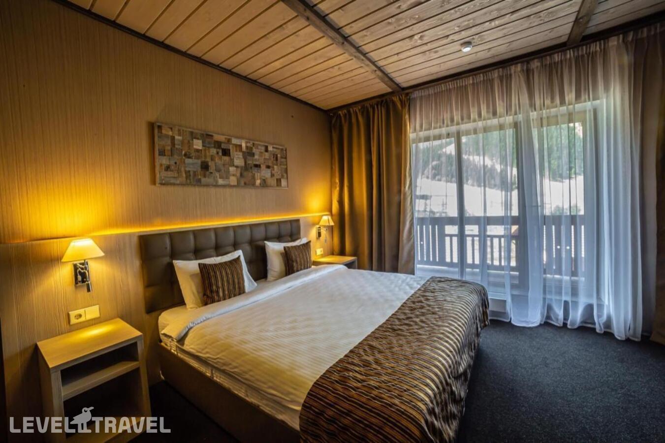 фотографии номера Апартаменты отеля Arkhyz Royal Resort & Spa в Россия(Архыз) - фото №1