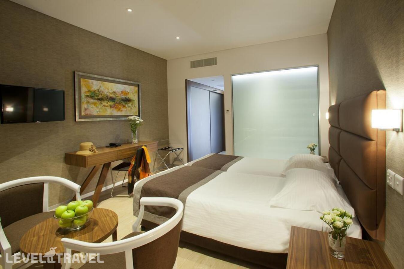 фотографии номера Стандартный с боковым видом на море отеля Faros Hotel в Кипр(Айа-Напа) - фото №1