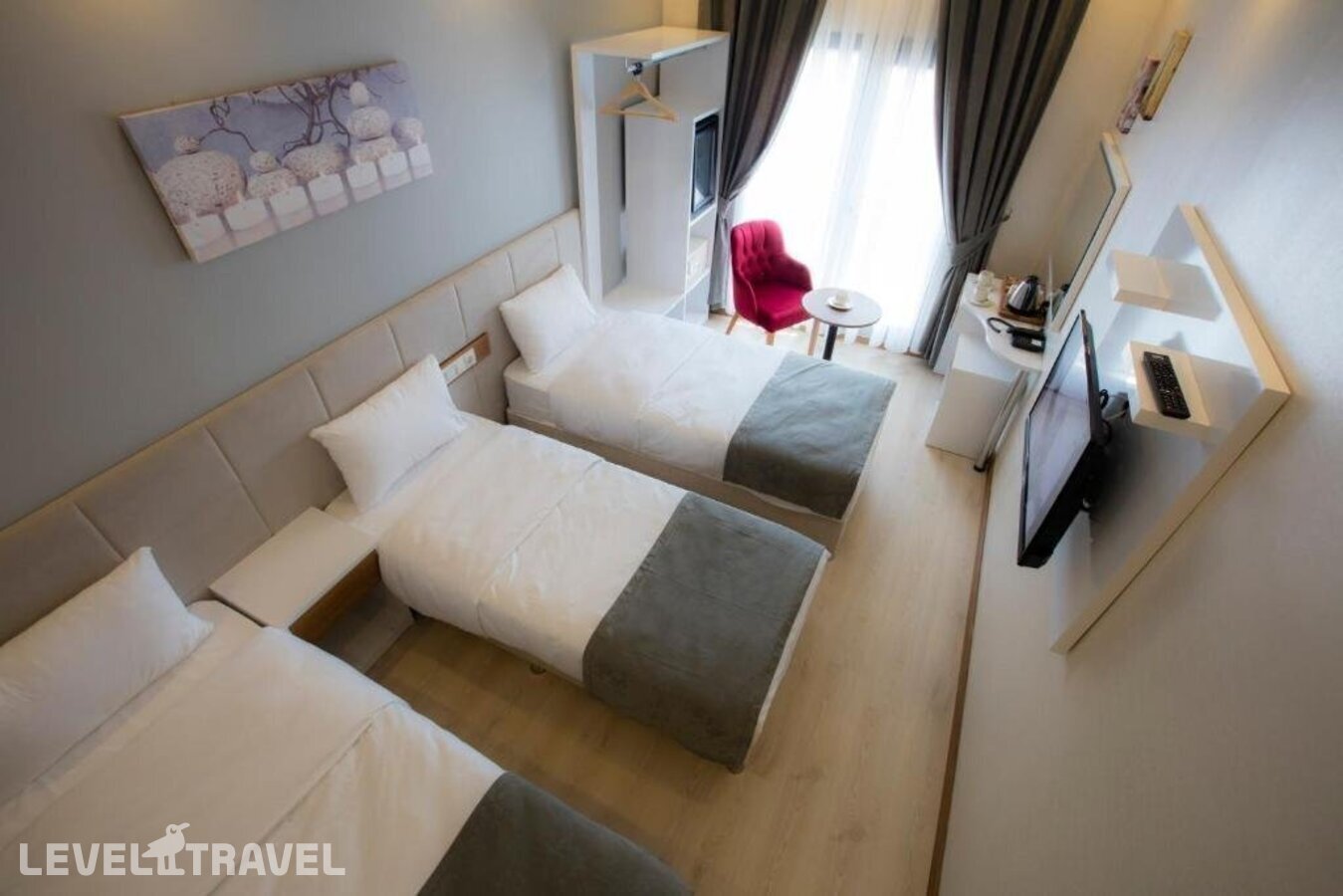 фотографии номера Трехместный делюкс отеля Royal Inci Airport Hotel в Турция(Кючюкчекмедже) - фото №1