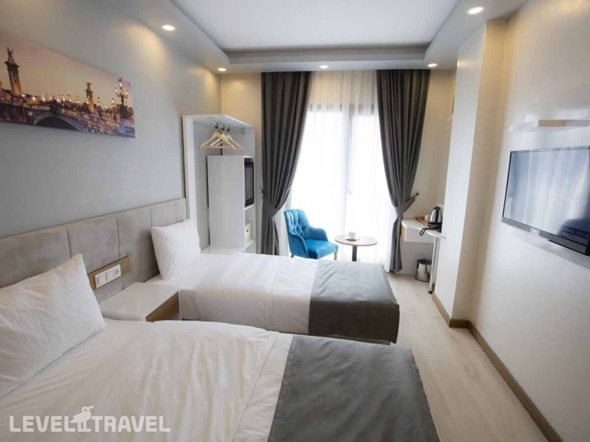 фотографии номера Семейный роскошный люкс отеля Royal Inci Airport Hotel в Турция(Кючюкчекмедже) - фото №32