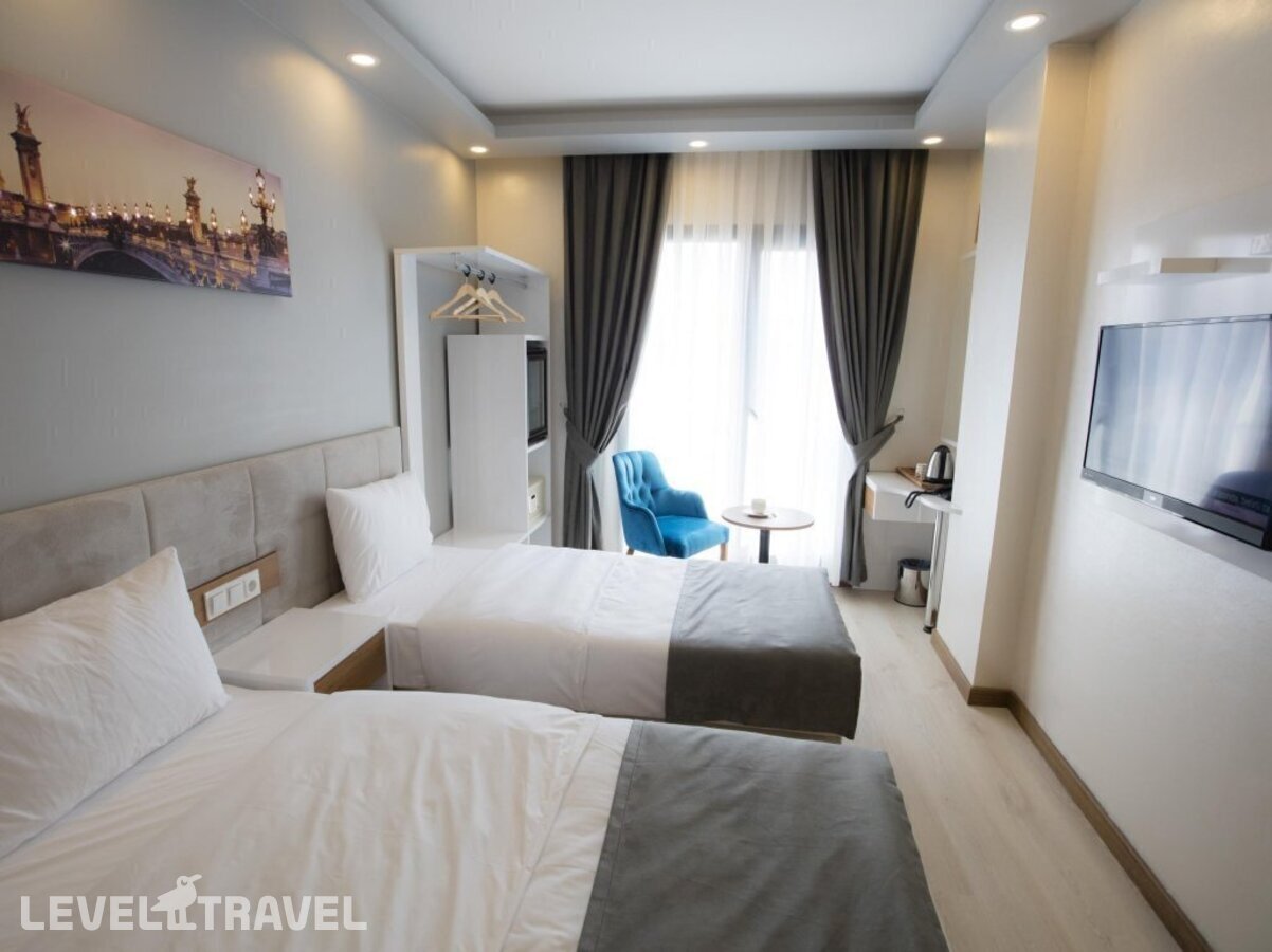 фотографии номера Семейный роскошный люкс отеля Royal Inci Airport Hotel в Турция(Кючюкчекмедже) - фото №8