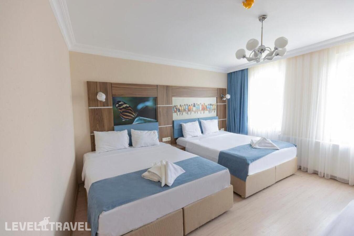 фотографии номера Четырехместный номер отеля De Maree Hotel в Турция(Султанахмет) - фото №1