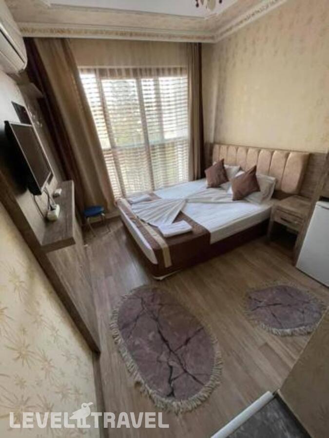 фотографии номера Стандартный номер отеля Ozgur Hotel в Турция(Анталья - Центр) - фото №1