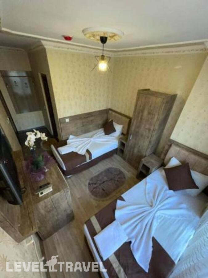 фотографии номера Стандартный номер отеля Ozgur Hotel в Турция(Анталья - Центр) - фото №4