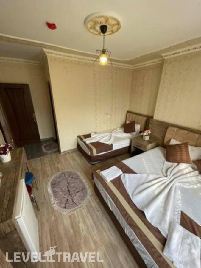 фотографии номера Семейный номер отеля Ozgur Hotel в Турция(Анталья - Центр) - фото №6