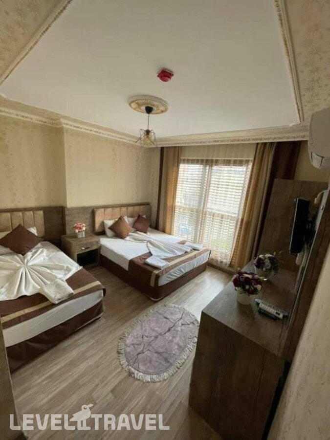 фотографии номера Семейный номер отеля Ozgur Hotel в Турция(Анталья - Центр) - фото №26