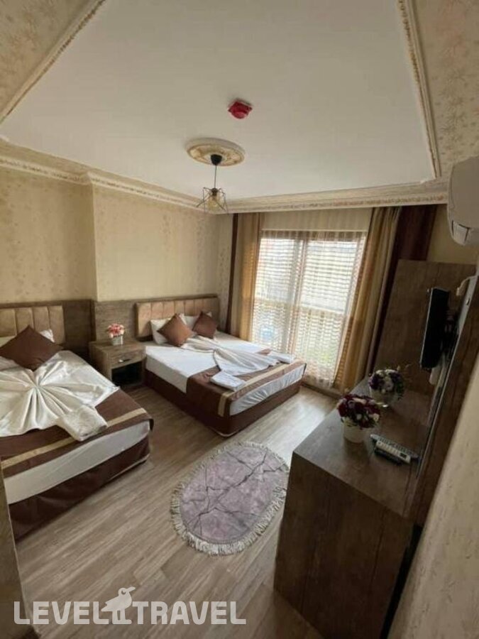 фотографии номера Семейный номер отеля Ozgur Hotel в Турция(Анталья - Центр) - фото №17
