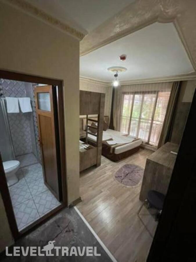 фотографии номера Семейный номер отеля Ozgur Hotel в Турция(Анталья - Центр) - фото №4