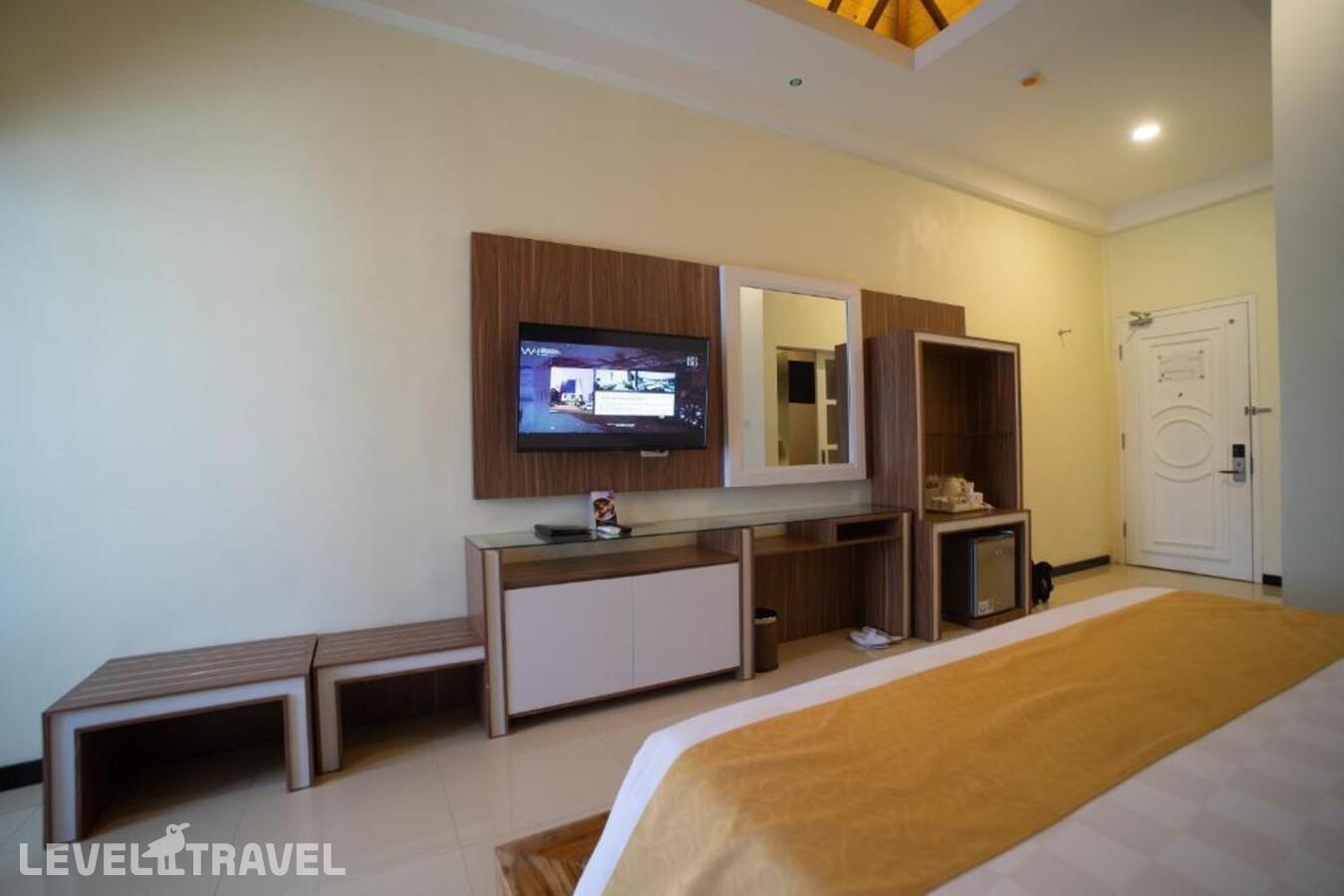фотографии номера Полулюкс отеля Luminor Hotel Banyuwangi Yos Sudarso в Индонезия(Баньюванги) - фото №5
