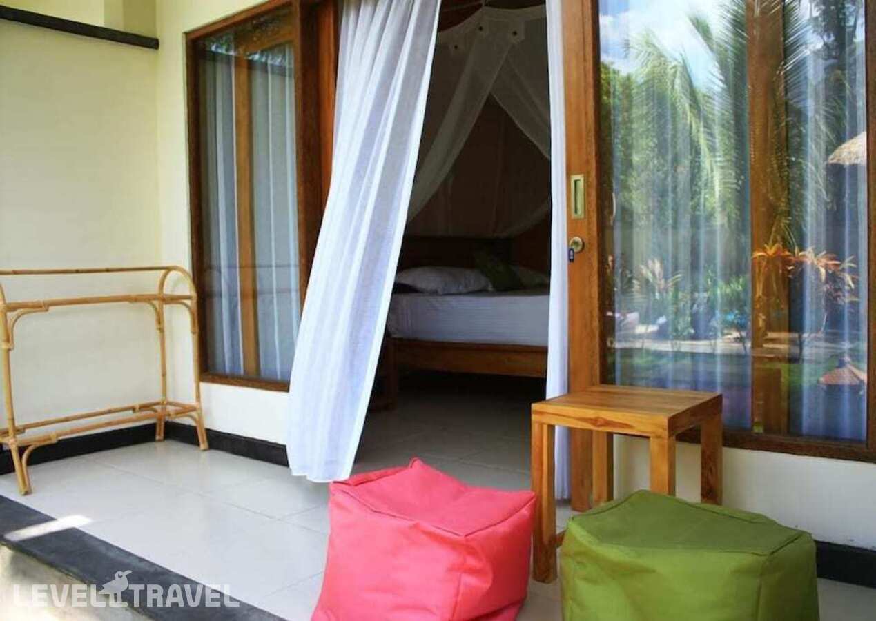 фотографии номера Трехместный улучшенный отеля Arjuna Homestay в Индонезия(Булеленг) - фото №1