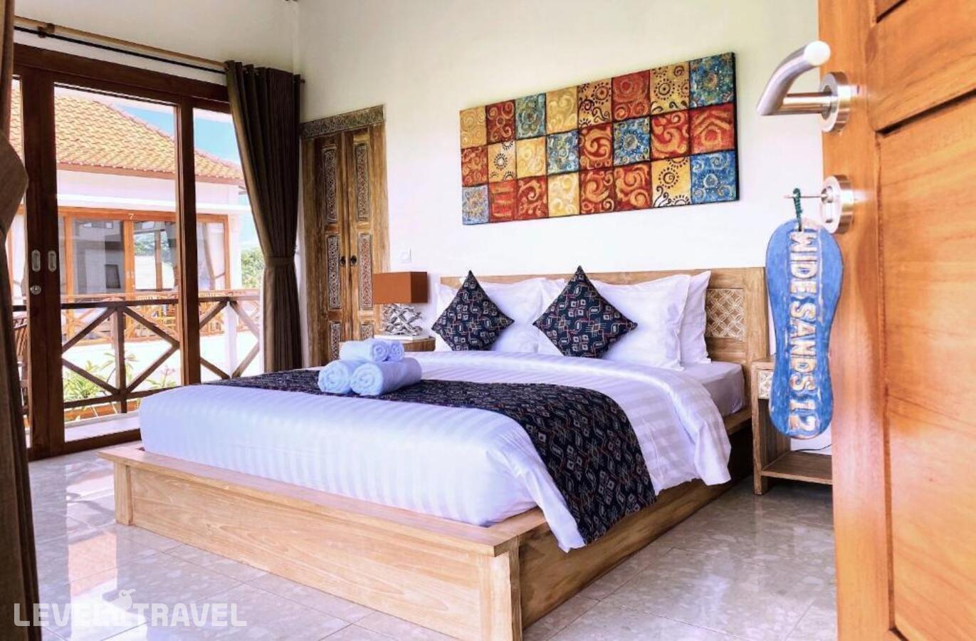 фотографии номера Улучшенный номер отеля Wide Sands Beach Retreat в Индонезия(Мендойо) - фото №17