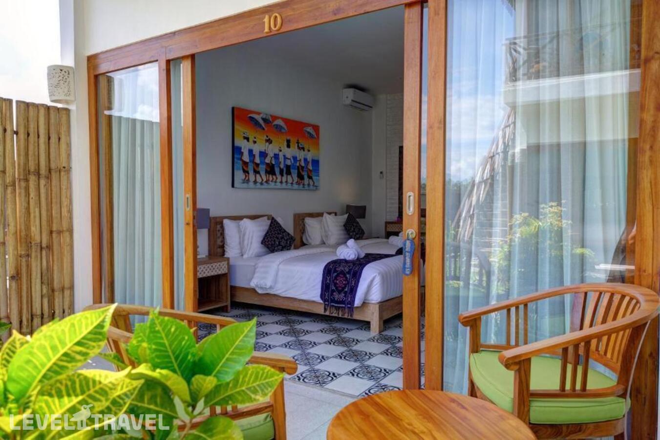 фотографии номера Улучшенный номер отеля Wide Sands Beach Retreat в Индонезия(Мендойо) - фото №13