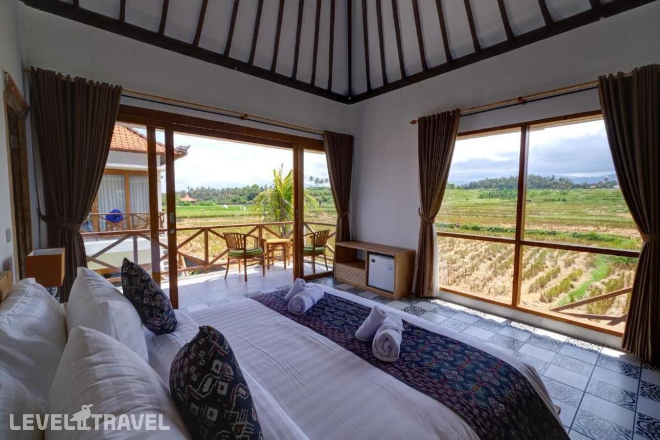 фотографии номера Улучшенный номер отеля Wide Sands Beach Retreat в Индонезия(Мендойо) - фото №11