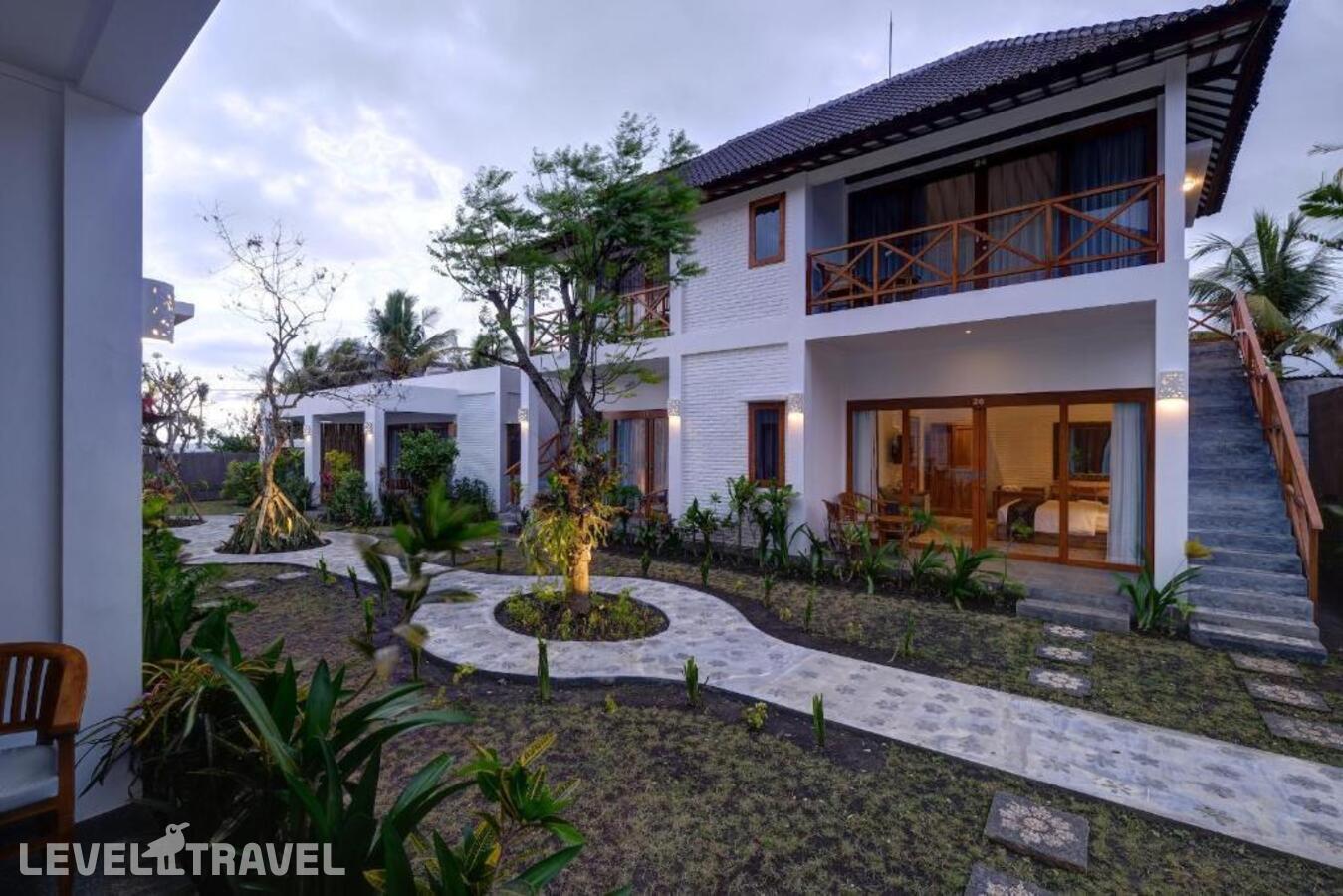 фотографии номера Делюкс отеля Wide Sands Beach Retreat в Индонезия(Мендойо) - фото №17