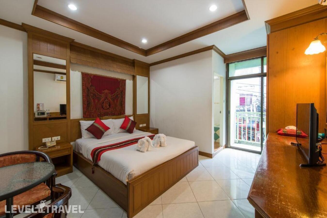 фотографии номера Стандартный номер отеля Magnific Guesthouse Patong в Таиланд(Патонг Бич) - фото №1