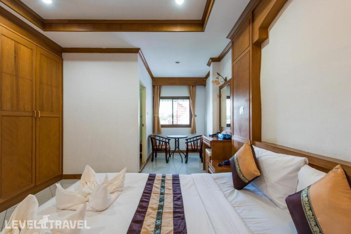 фотографии номера Улучшенный номер отеля Magnific Guesthouse Patong в Таиланд(Патонг Бич) - фото №2