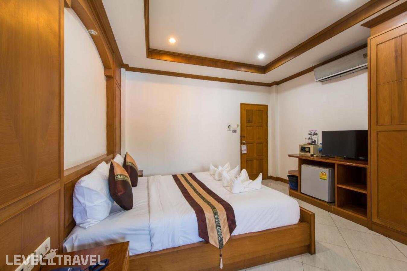 фотографии номера Улучшенный номер отеля Magnific Guesthouse Patong в Таиланд(Патонг Бич) - фото №3