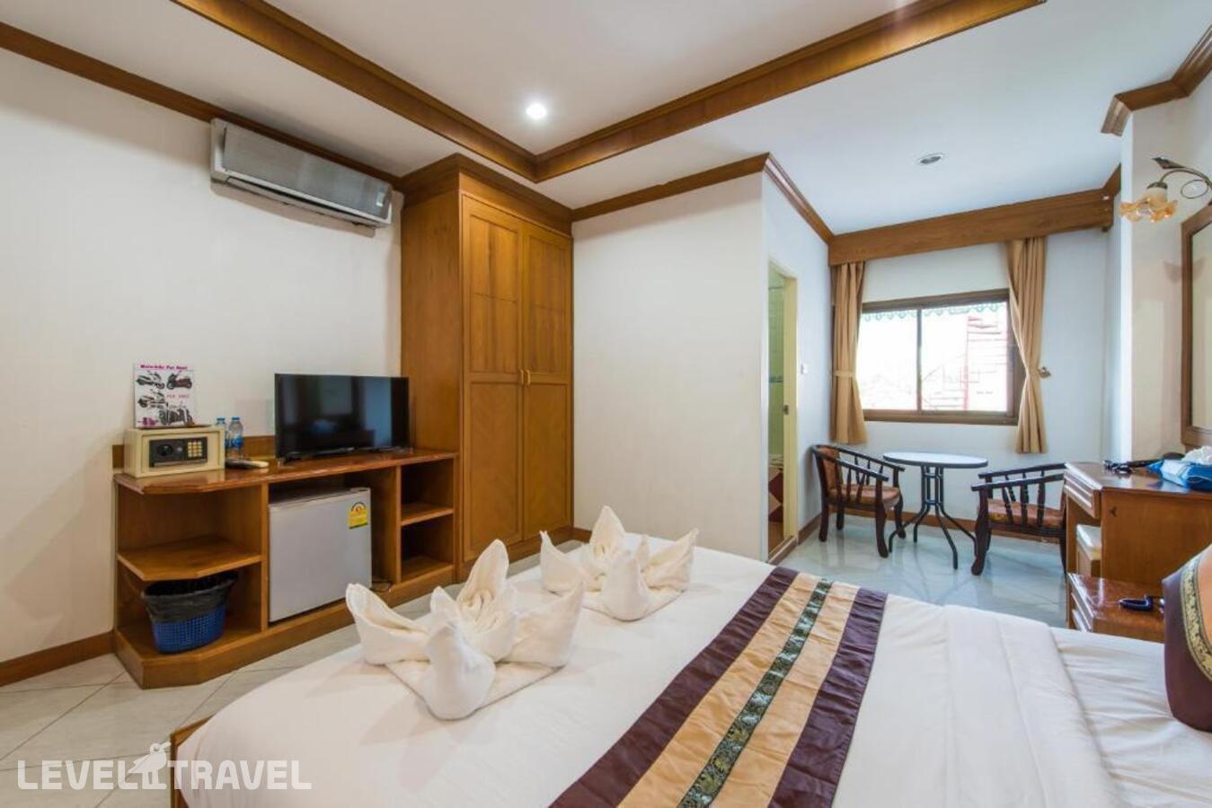 фотографии номера Улучшенный номер отеля Magnific Guesthouse Patong в Таиланд(Патонг Бич) - фото №1