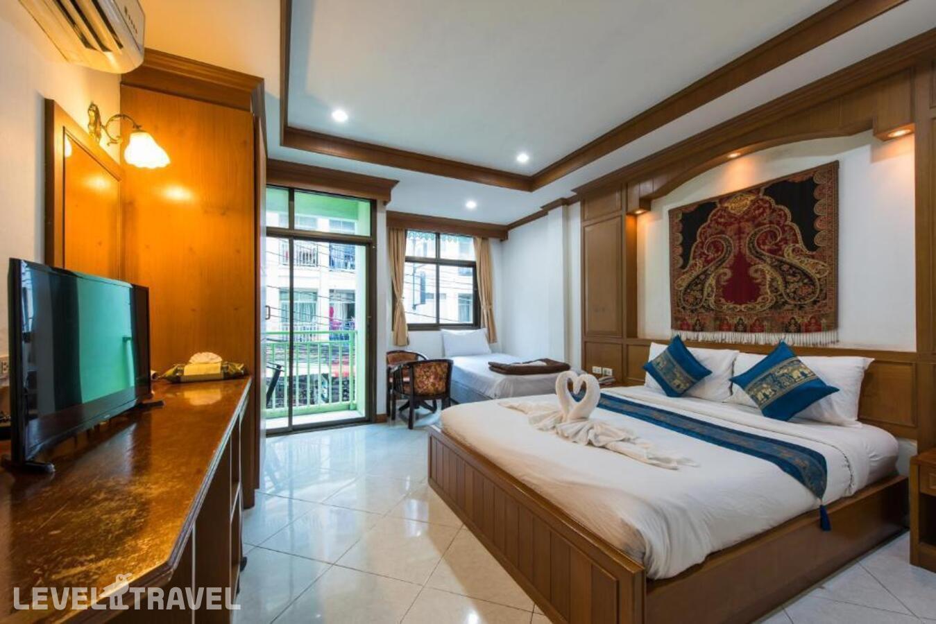 фотографии номера Семейный номер отеля Magnific Guesthouse Patong в Таиланд(Патонг Бич) - фото №4