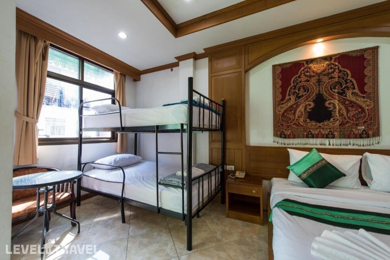 фотографии номера Семейный номер отеля Magnific Guesthouse Patong в Таиланд(Патонг Бич) - фото №20