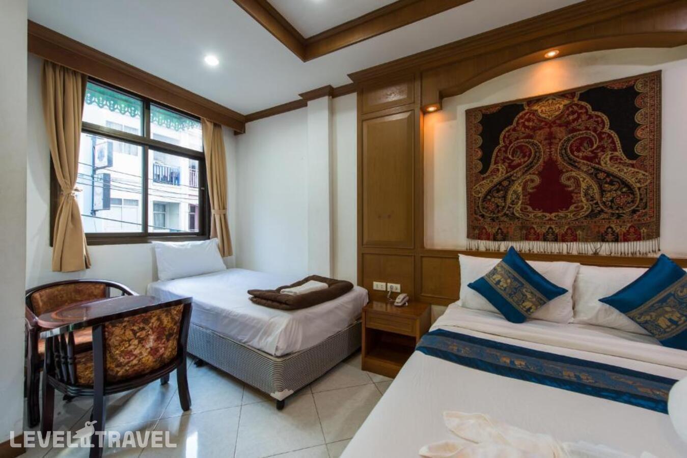 фотографии номера Семейный номер отеля Magnific Guesthouse Patong в Таиланд(Патонг Бич) - фото №7