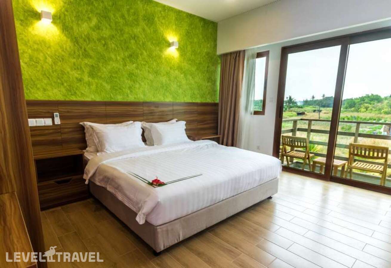 фотографии номера Делюкс с видом на сад отеля Olive Goidhoo Guest House в Мальдивы(Баа Атолл) - фото №1