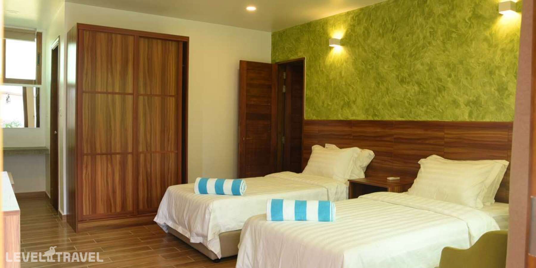 фотографии номера Делюкс с видом на сад отеля Olive Goidhoo Guest House в Мальдивы(Баа Атолл) - фото №2