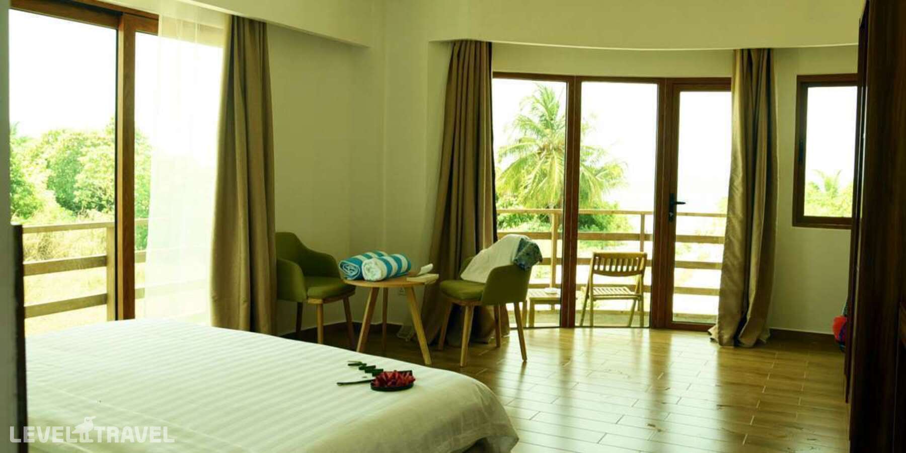 фотографии номера Делюкс с видом на море отеля Olive Goidhoo Guest House в Мальдивы(Баа Атолл) - фото №2