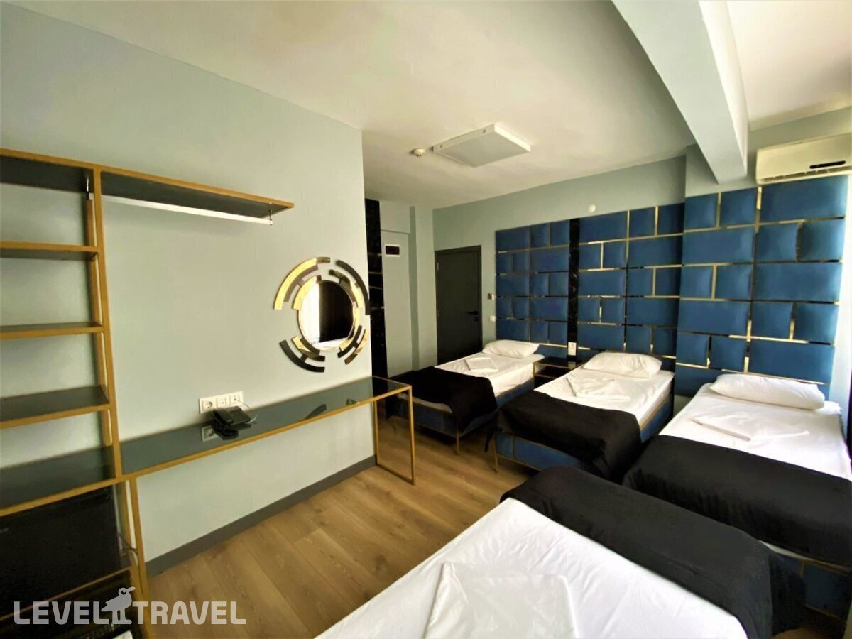 фотографии номера Четырехместный номер отеля Orange Airport Hotel в Турция(Бахчелиэвлер) - фото №12