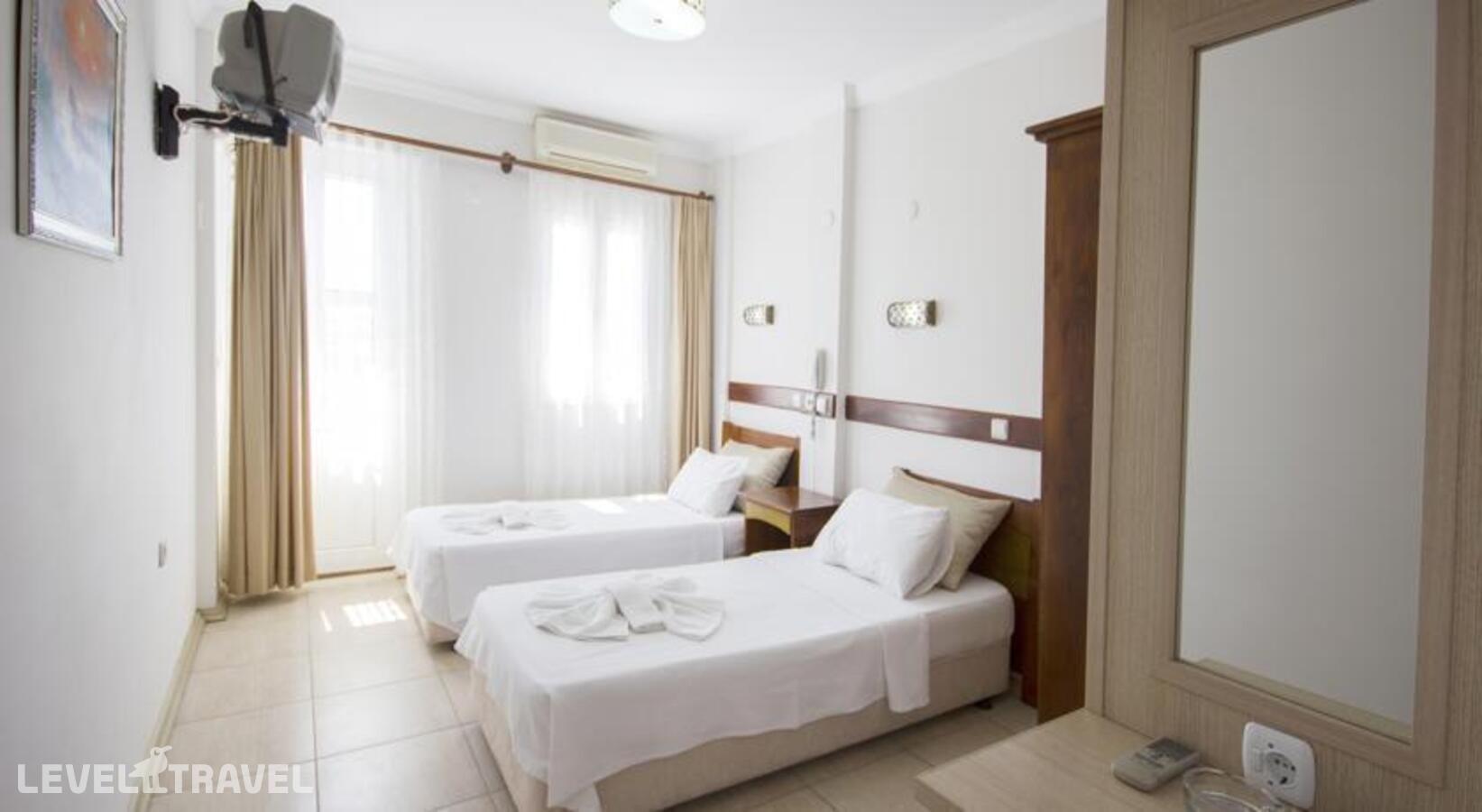 фотографии номера Стандартный номер отеля Akkan Beach Hotel в Турция(Бодрум - центр) - фото №1