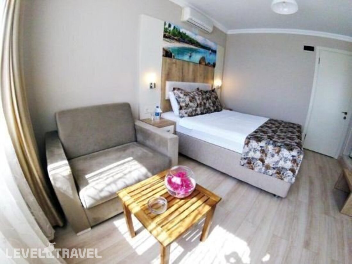 фотографии номера Стандартный номер отеля Akkan Beach Hotel в Турция(Бодрум - центр) - фото №15
