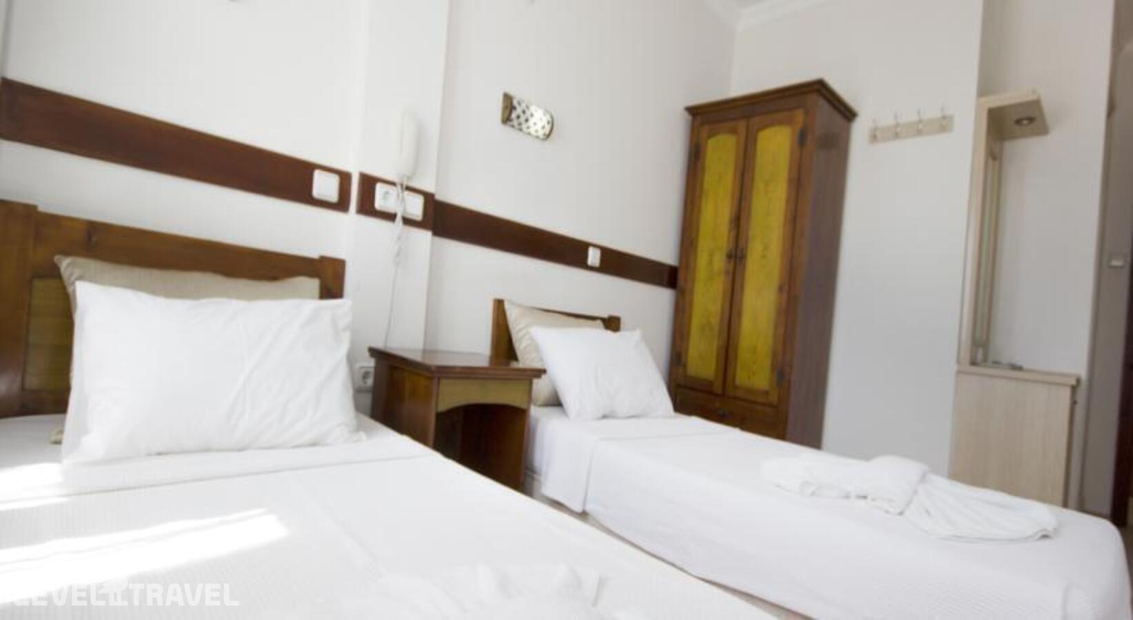 фотографии номера Стандартный номер отеля Akkan Beach Hotel в Турция(Бодрум - центр) - фото №5