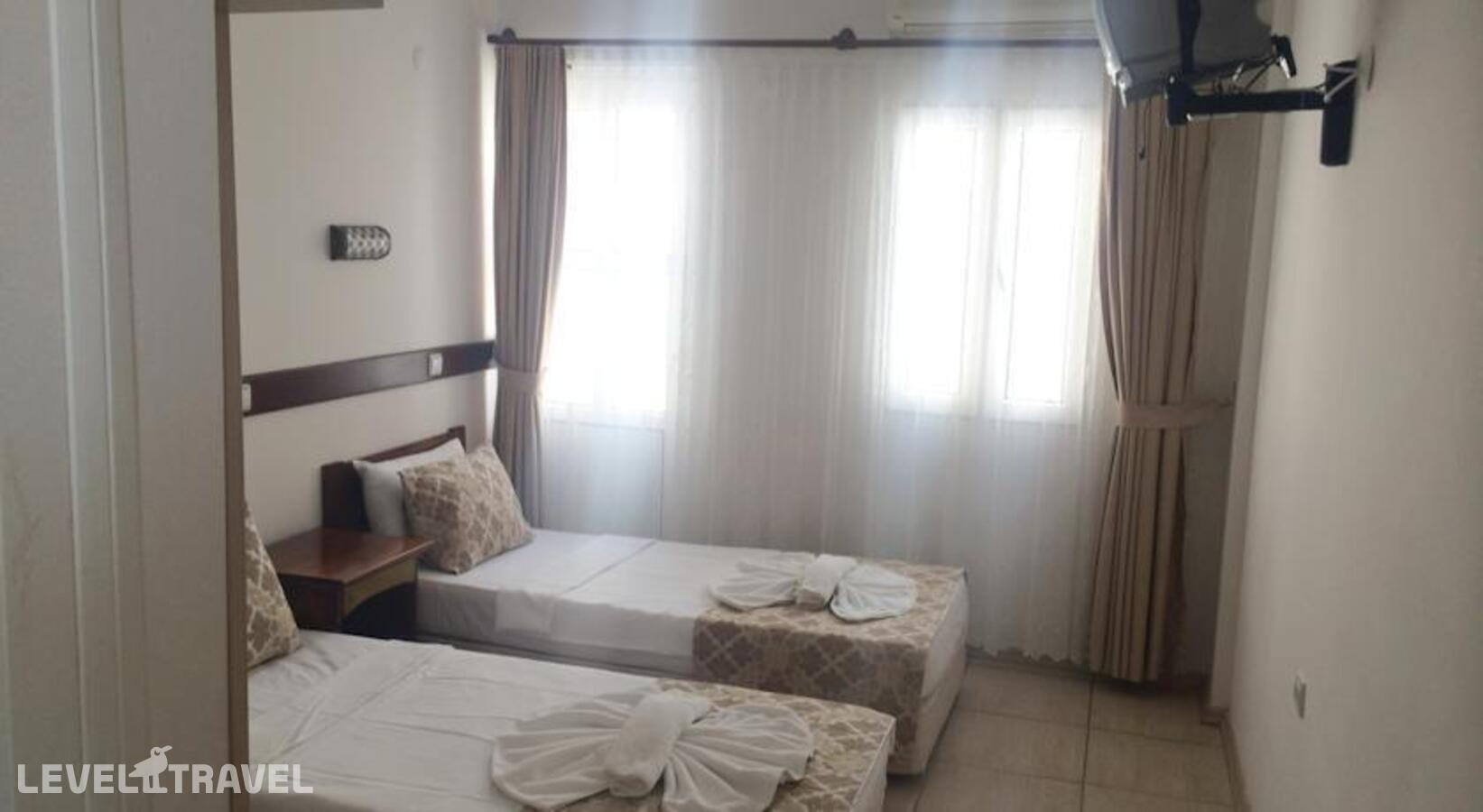 фотографии номера Стандартный номер отеля Akkan Beach Hotel в Турция(Бодрум - центр) - фото №7