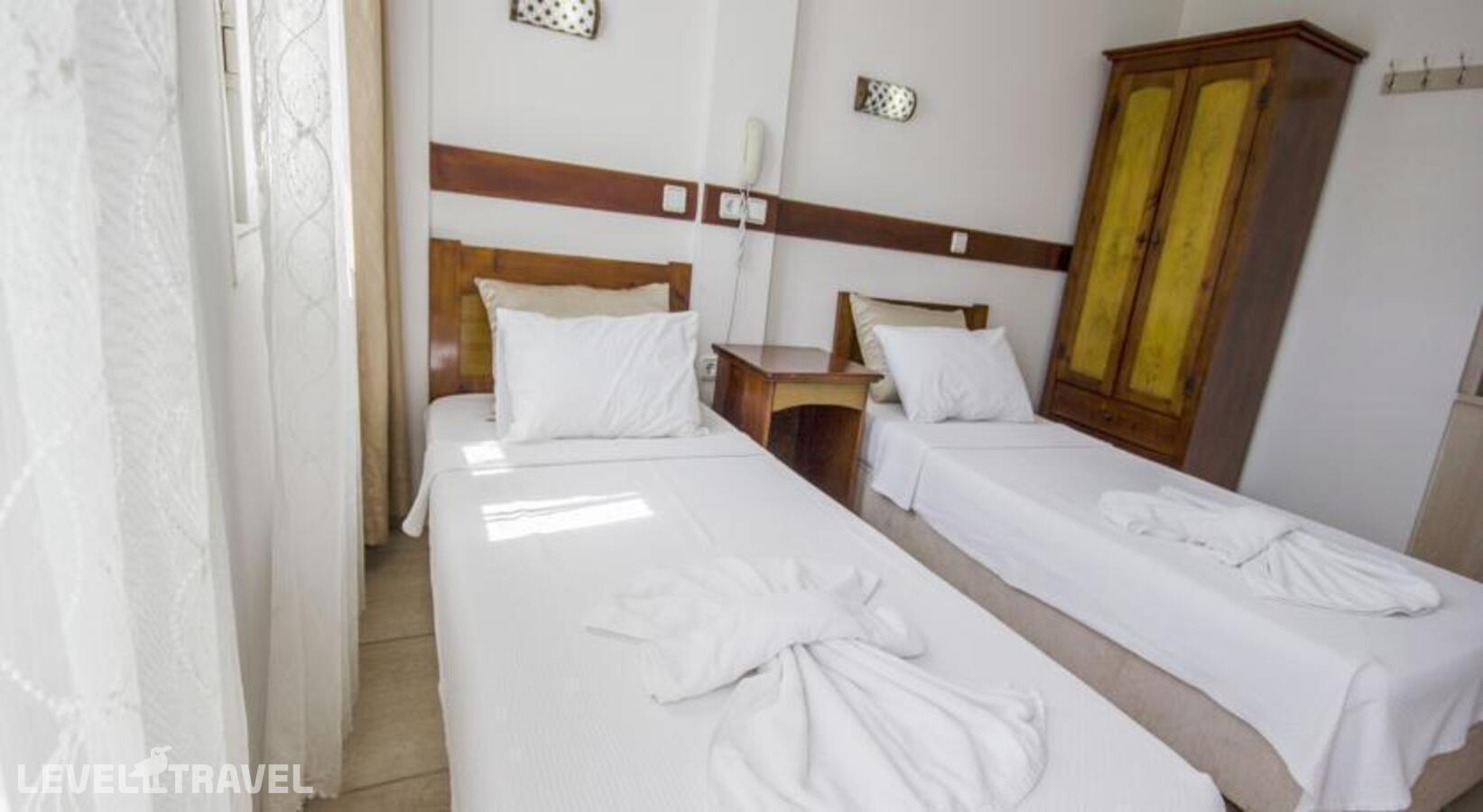 фотографии номера Стандартный номер отеля Akkan Beach Hotel в Турция(Бодрум - центр) - фото №9