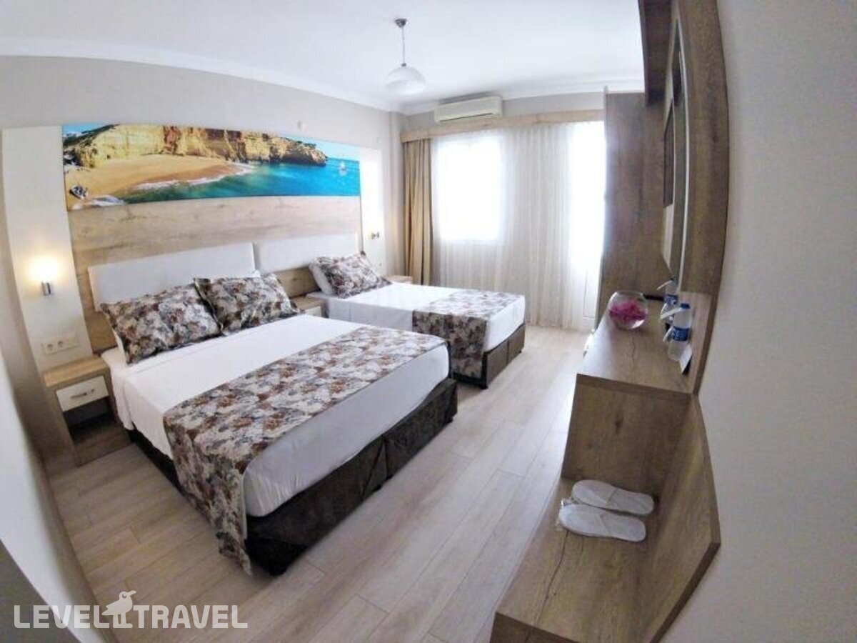 фотографии номера Стандартный номер отеля Akkan Beach Hotel в Турция(Бодрум - центр) - фото №27