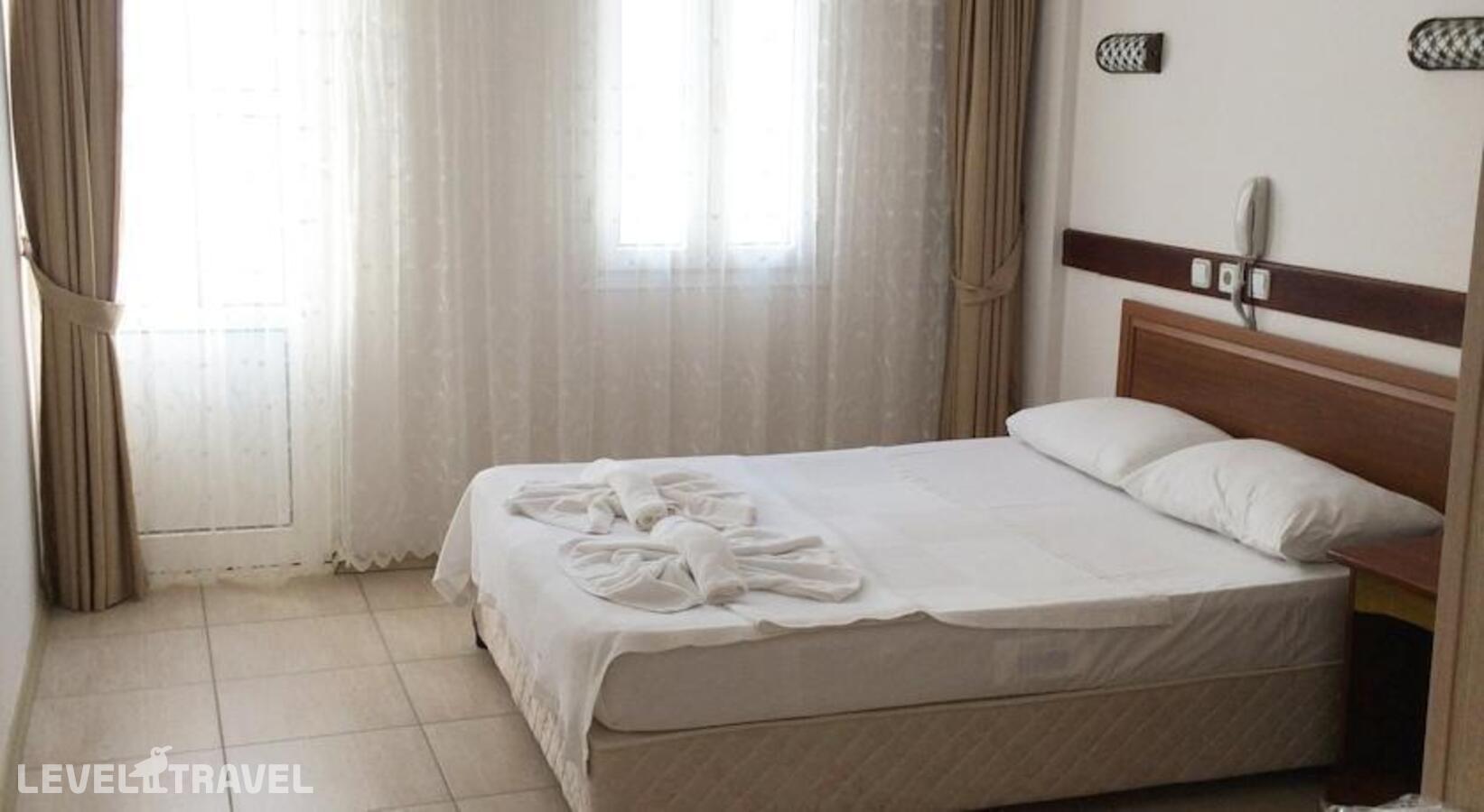 фотографии номера Стандартный номер отеля Akkan Beach Hotel в Турция(Бодрум - центр) - фото №8