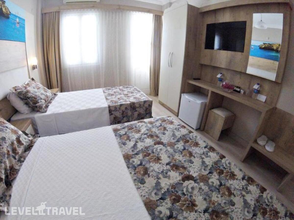 фотографии номера Стандартный номер отеля Akkan Beach Hotel в Турция(Бодрум - центр) - фото №37