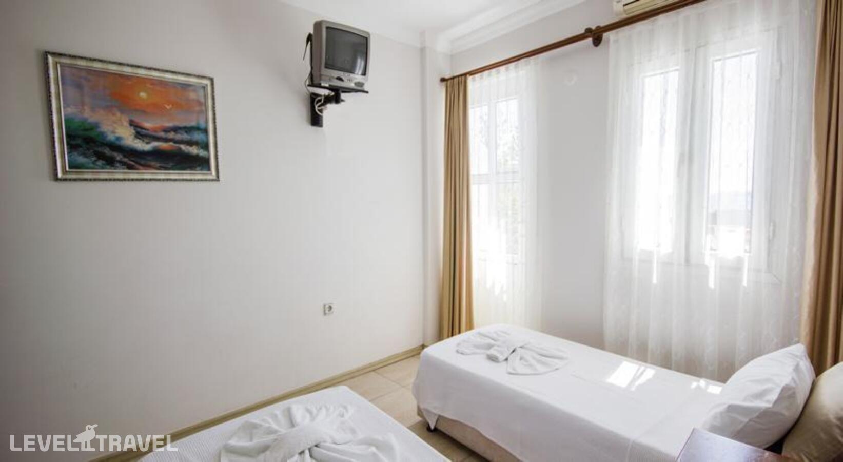 фотографии номера Стандартный номер отеля Akkan Beach Hotel в Турция(Бодрум - центр) - фото №4