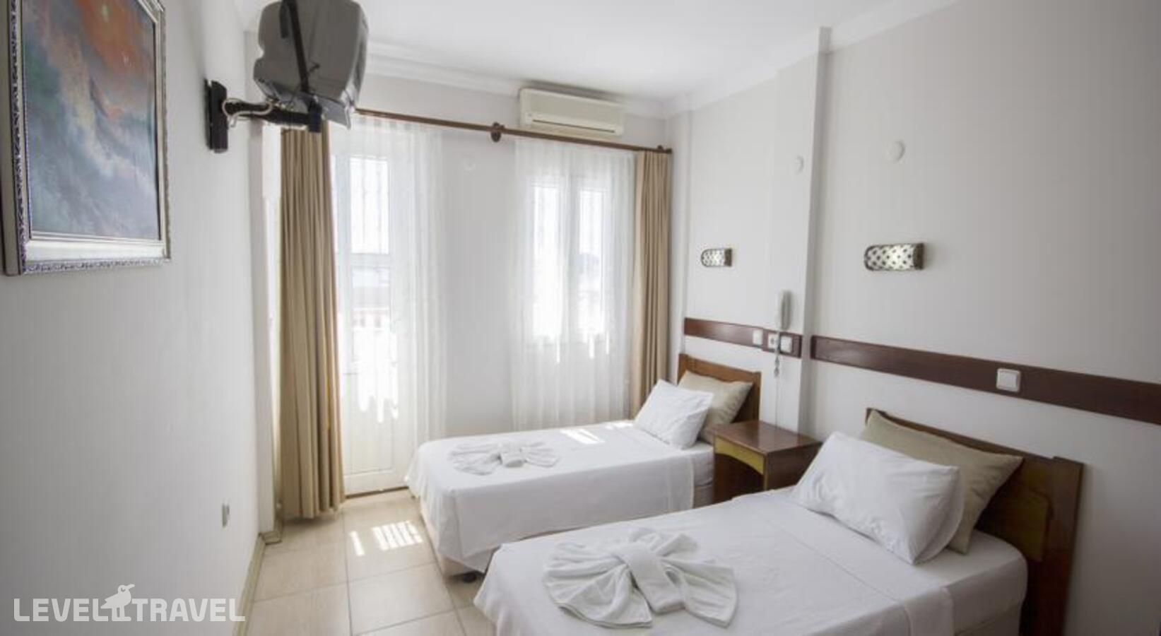 фотографии номера Стандартный номер отеля Akkan Beach Hotel в Турция(Бодрум - центр) - фото №6