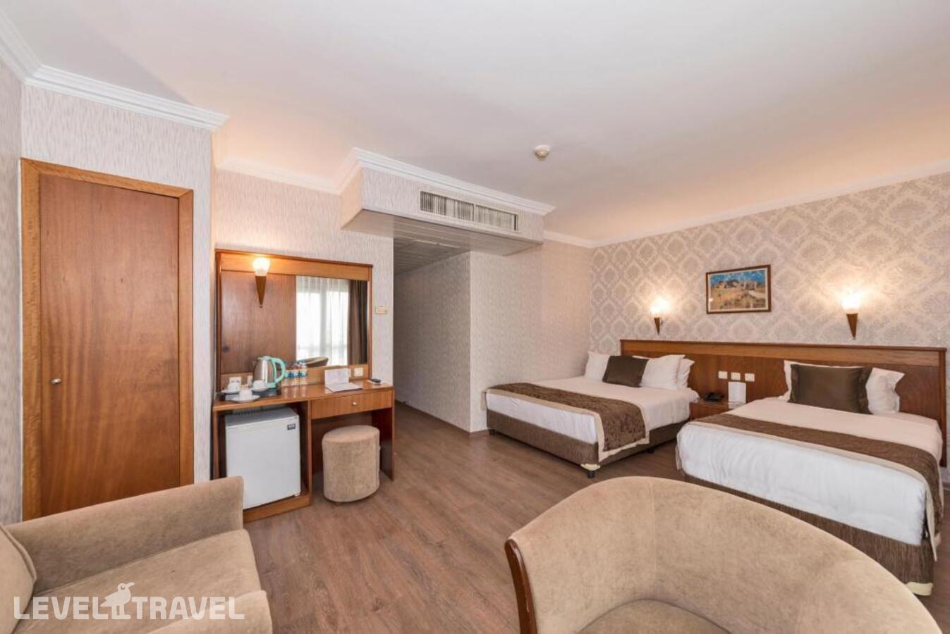 фотографии номера Трехместный номер отеля Lion Hotel в Турция(Бейоглу) - фото №1