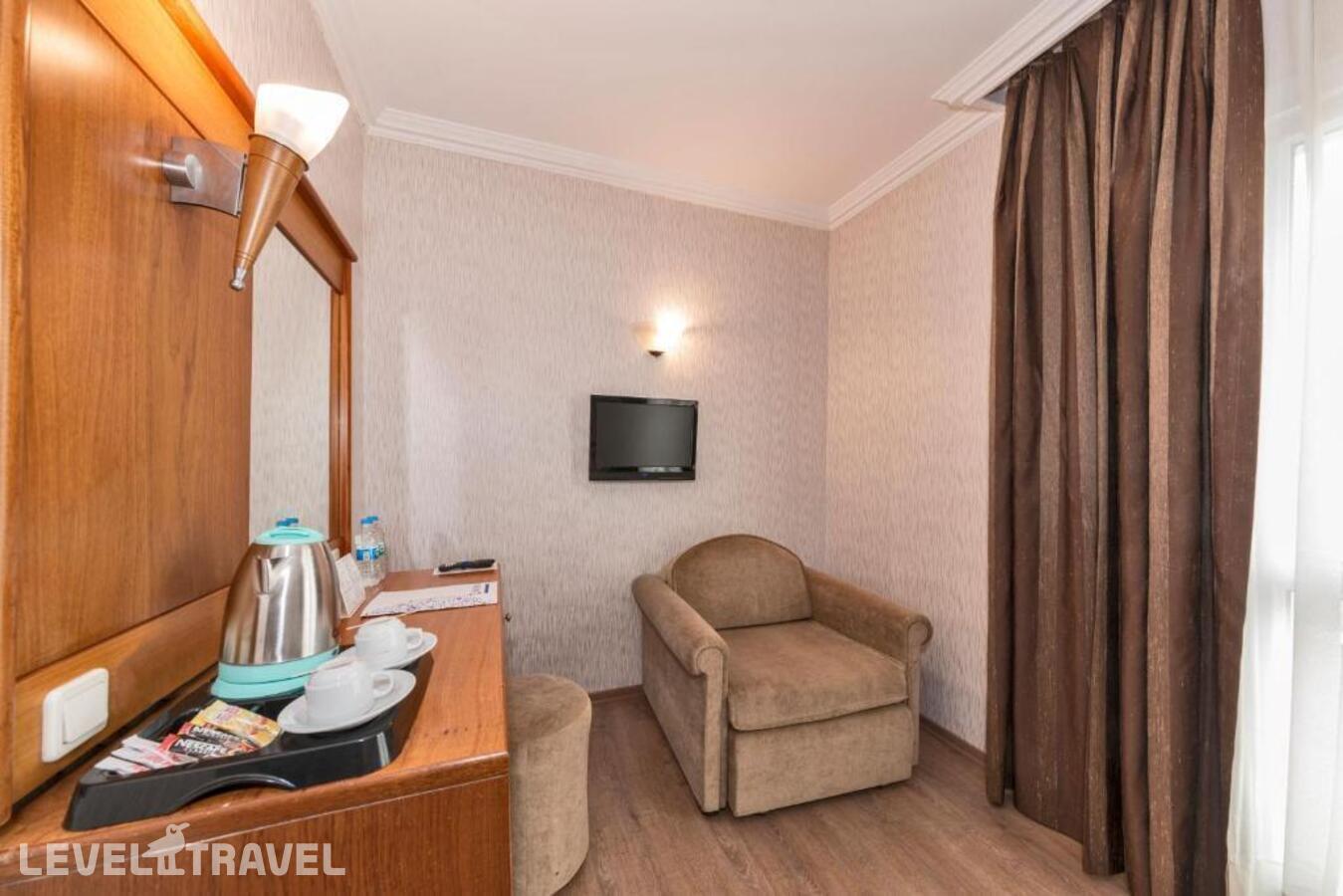 фотографии номера Трехместный номер отеля Lion Hotel в Турция(Бейоглу) - фото №10