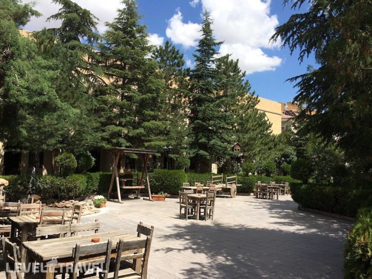 фотографии номера Трехместный номер отеля Burcu Kaya Hotel в Турция(Ортахисар) - фото №3