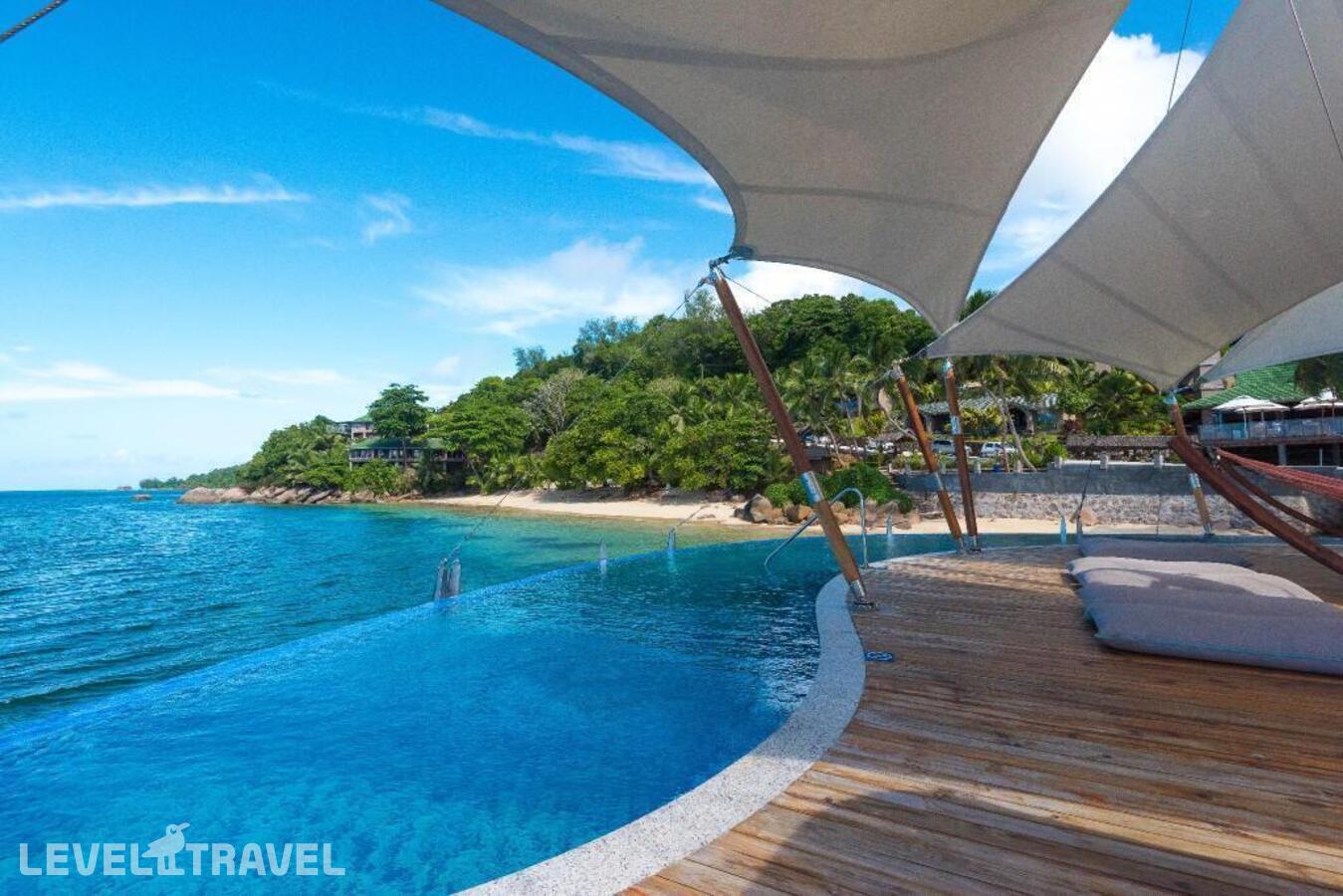 фотографии номера Полулюкс отеля Coco De Mer Hotel & Black Parrot Suites в Сейшелы(о. Праслен) - фото №2